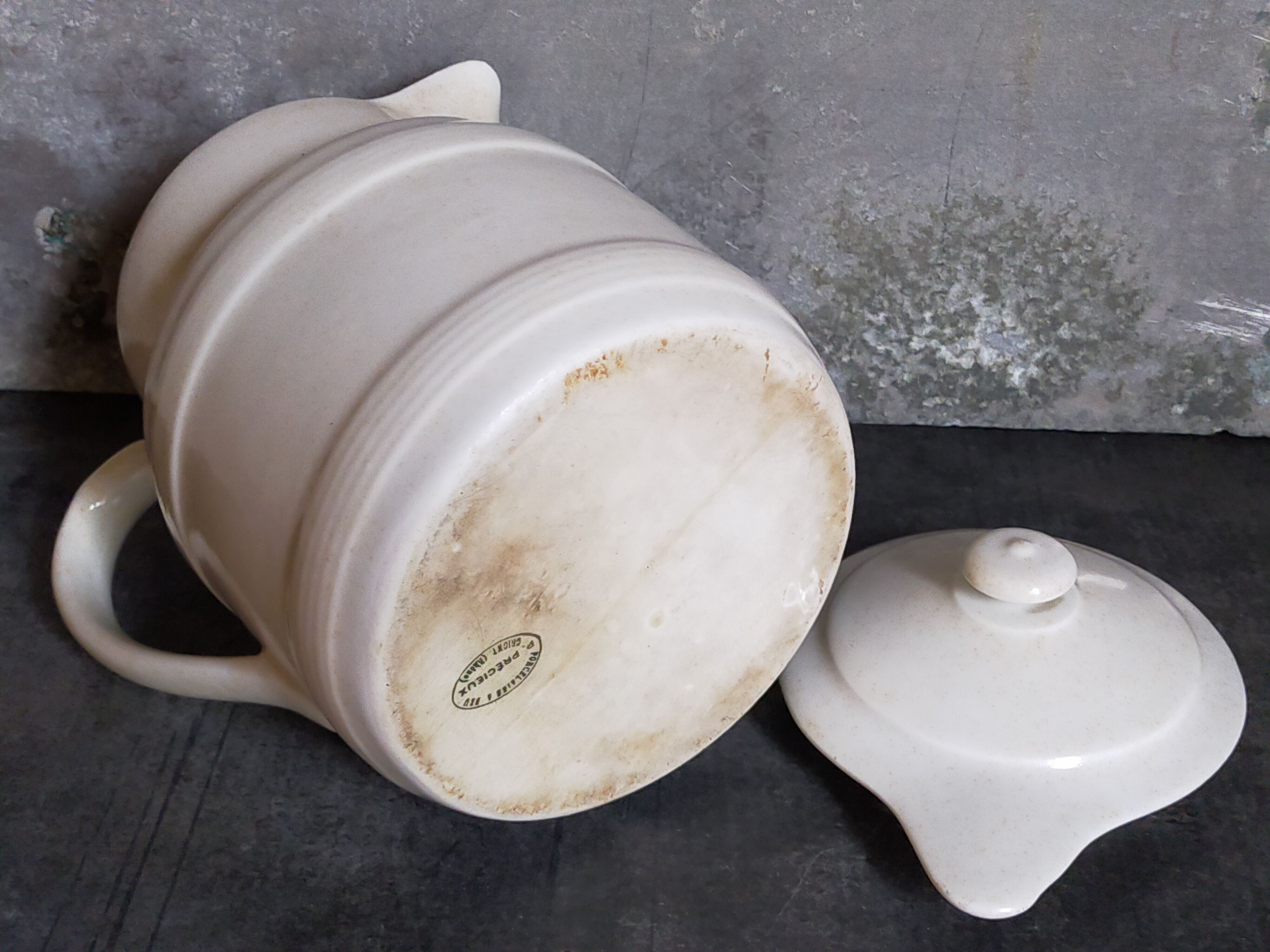 Covered pitcher in porcelain fire of Grigny XIXth stamped P.Precious