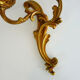 Former pair of double-light wall light in bronze or brass. Year 50 60