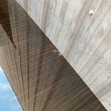 Scandinavian extendable dining table made of solid wood and rosewood effect.