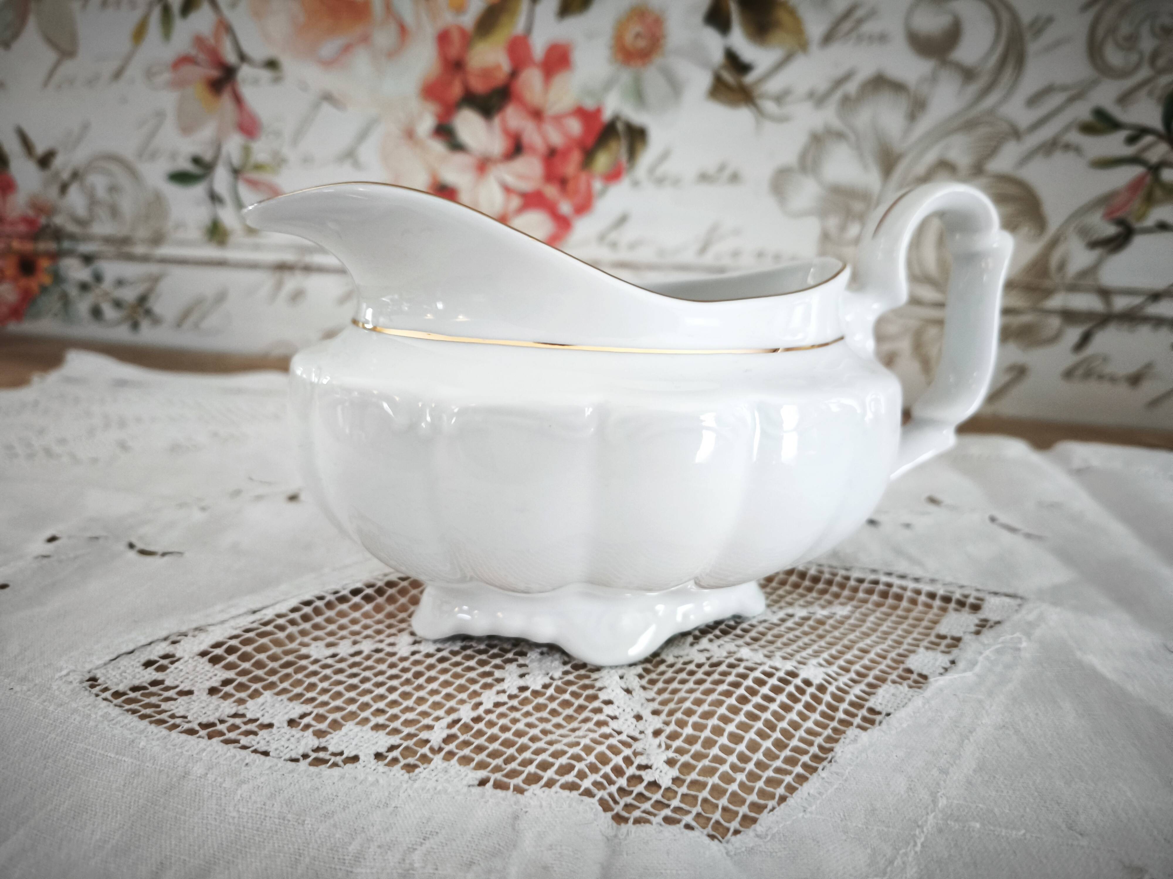 Porcelain sauceboat, white manufacture with double gold line, hand-painted.