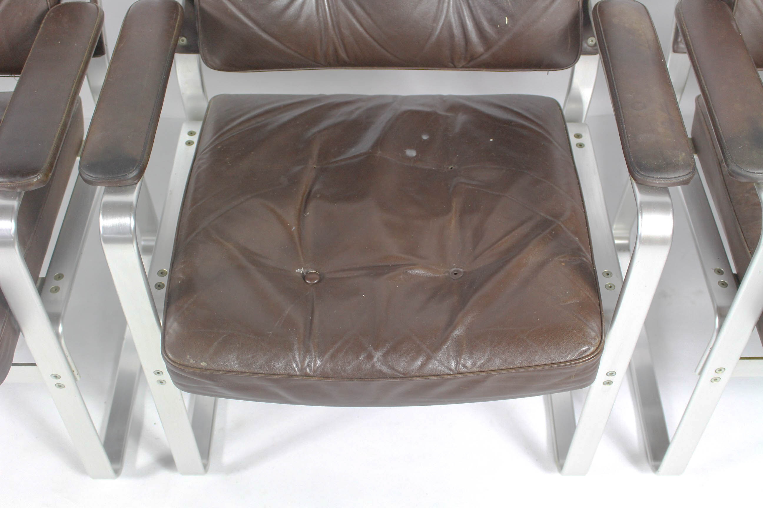 Swedish Mid Century Leather And Aluminum Armchairs By Karl Erik Ekselius For Joc Vetlanda, Set Of 4