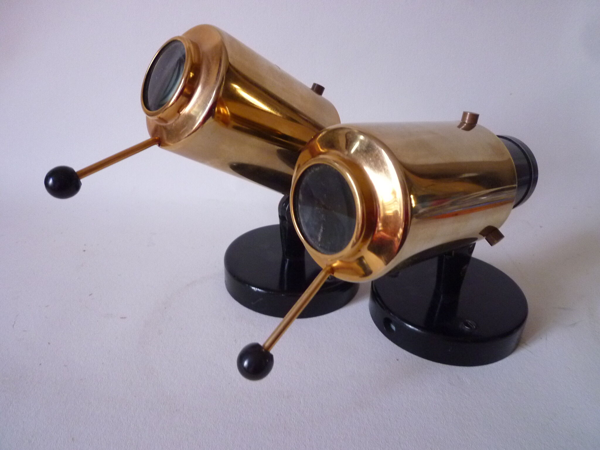 Pair of Zodiac sconces, C. Biny