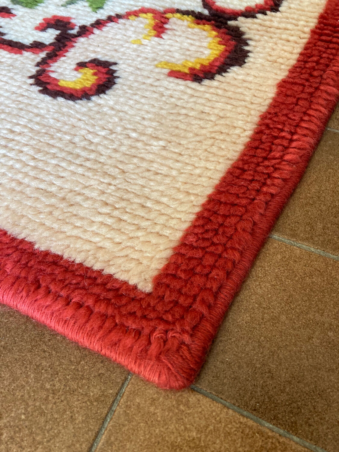 Vintage wool rug with floral decor