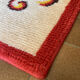 Vintage wool rug with floral decor