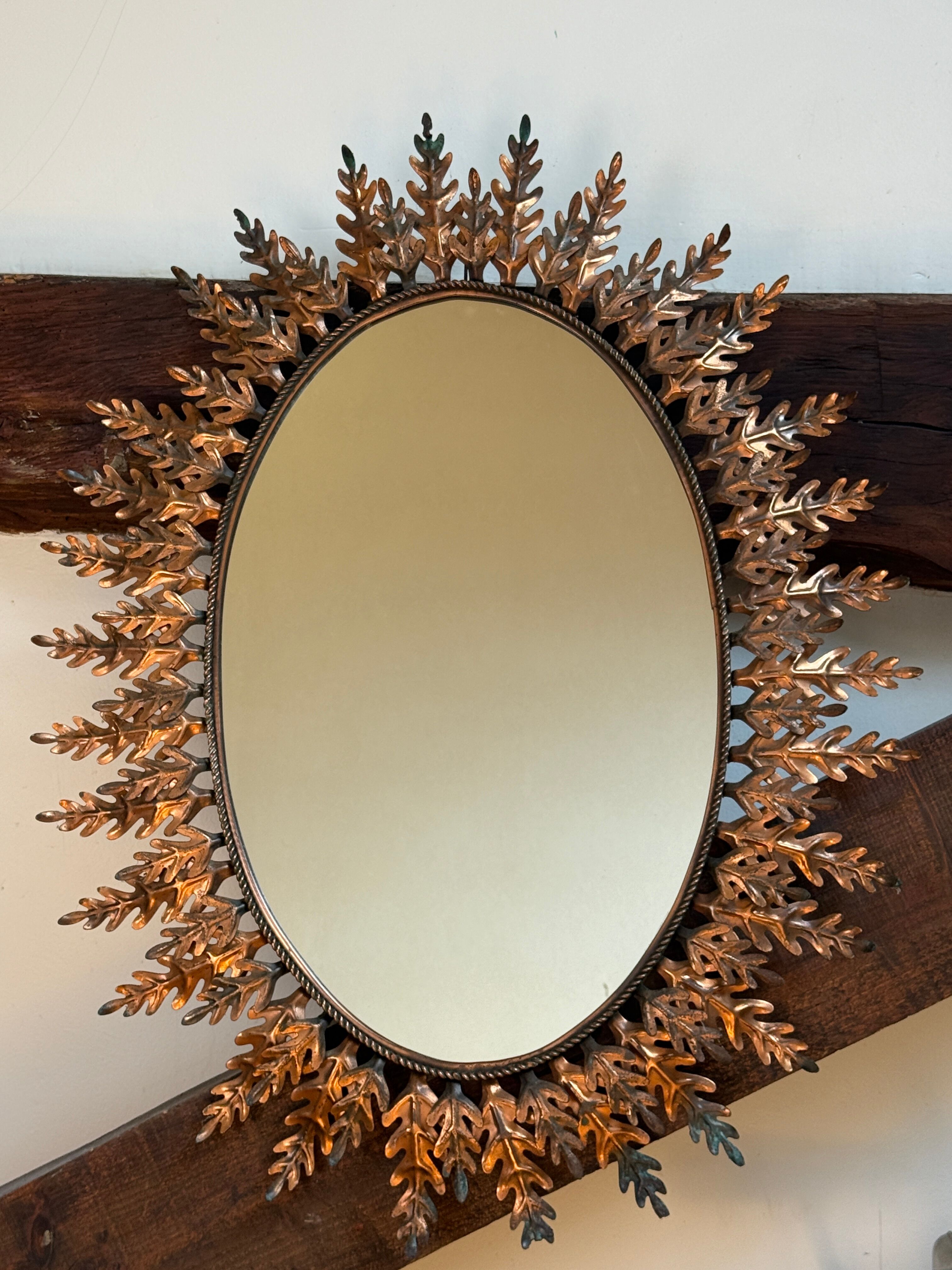 Oval sun mirror wrought iron from the 1950s Italy