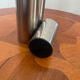 Vintage trio of brushed stainless steel candle holders