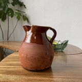 Glazed earthenware jug