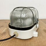 Industrial white porcelain cage wall light with ribbed glass, 1970s