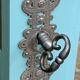 Beveled mirror on turquoise Parisian door