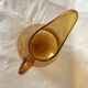 Blown glass jug with caramel bubbles