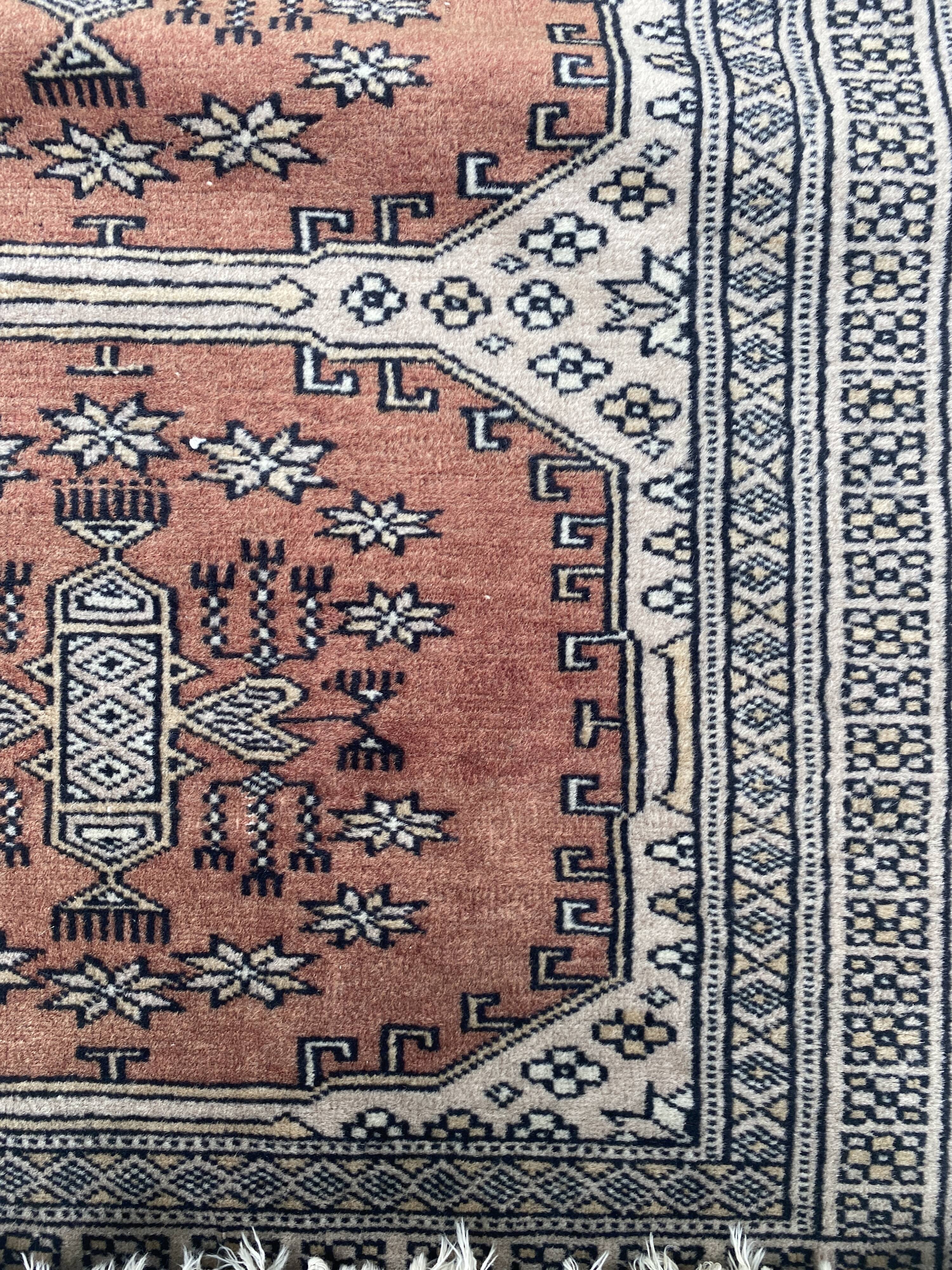 Vintage hand knotted rug with geometric patterns on a grey/beige/terracotta background 170 x 96 cm
