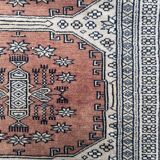 Vintage hand knotted rug with geometric patterns on a grey/beige/terracotta background 170 x 96 cm