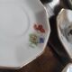 6 porcelain cups decorated with wildflowers from the 60s.