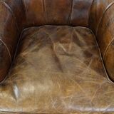 Stylish armchair with a unique design and beautiful finish, made of leather