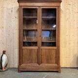 Old display case with bubbled glass
