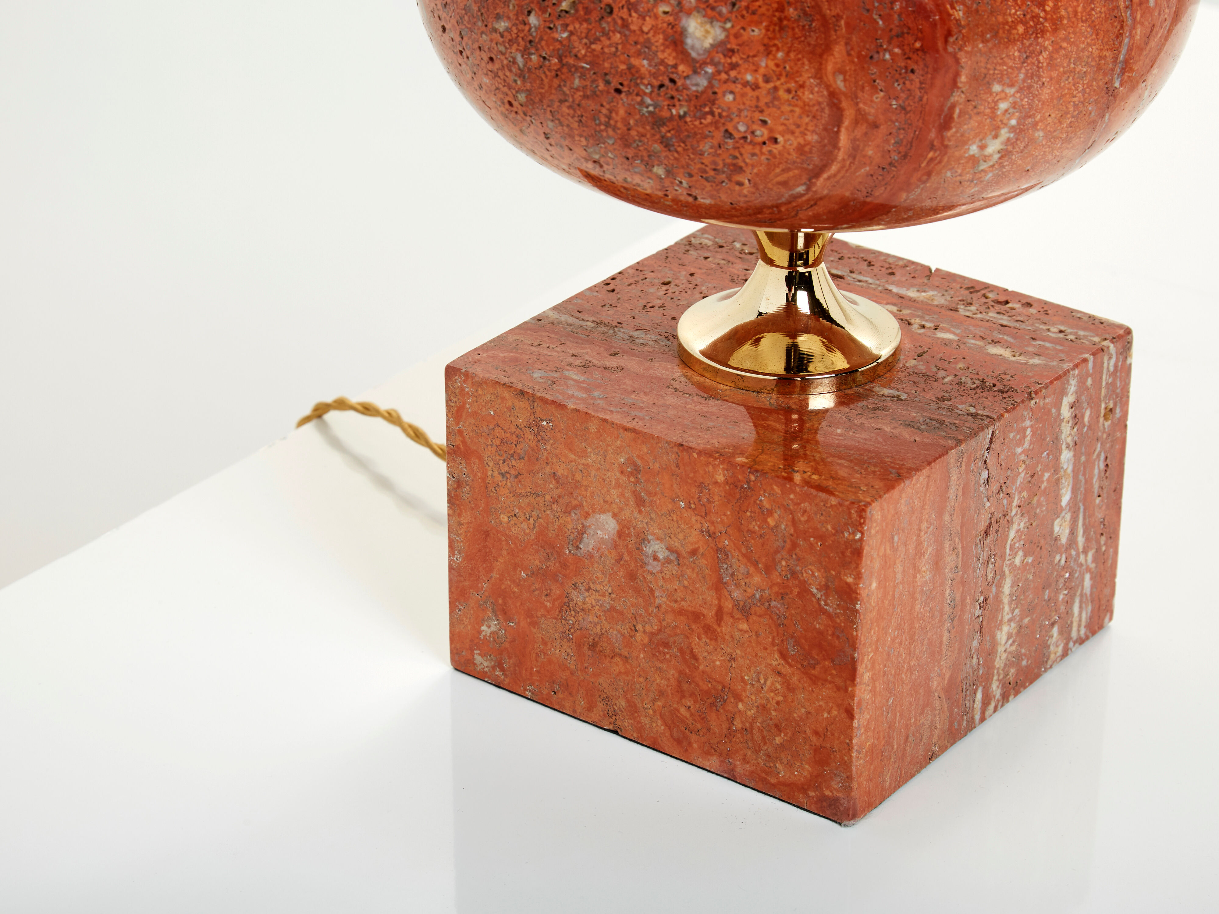 Pair of lamps in red travertine and brass 1970