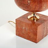 Pair of lamps in red travertine and brass 1970