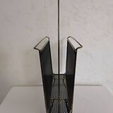 Vintage gold magazine rack from the 1960s.