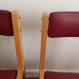 Série de 4 chaises années 60 bois blond et skaï
