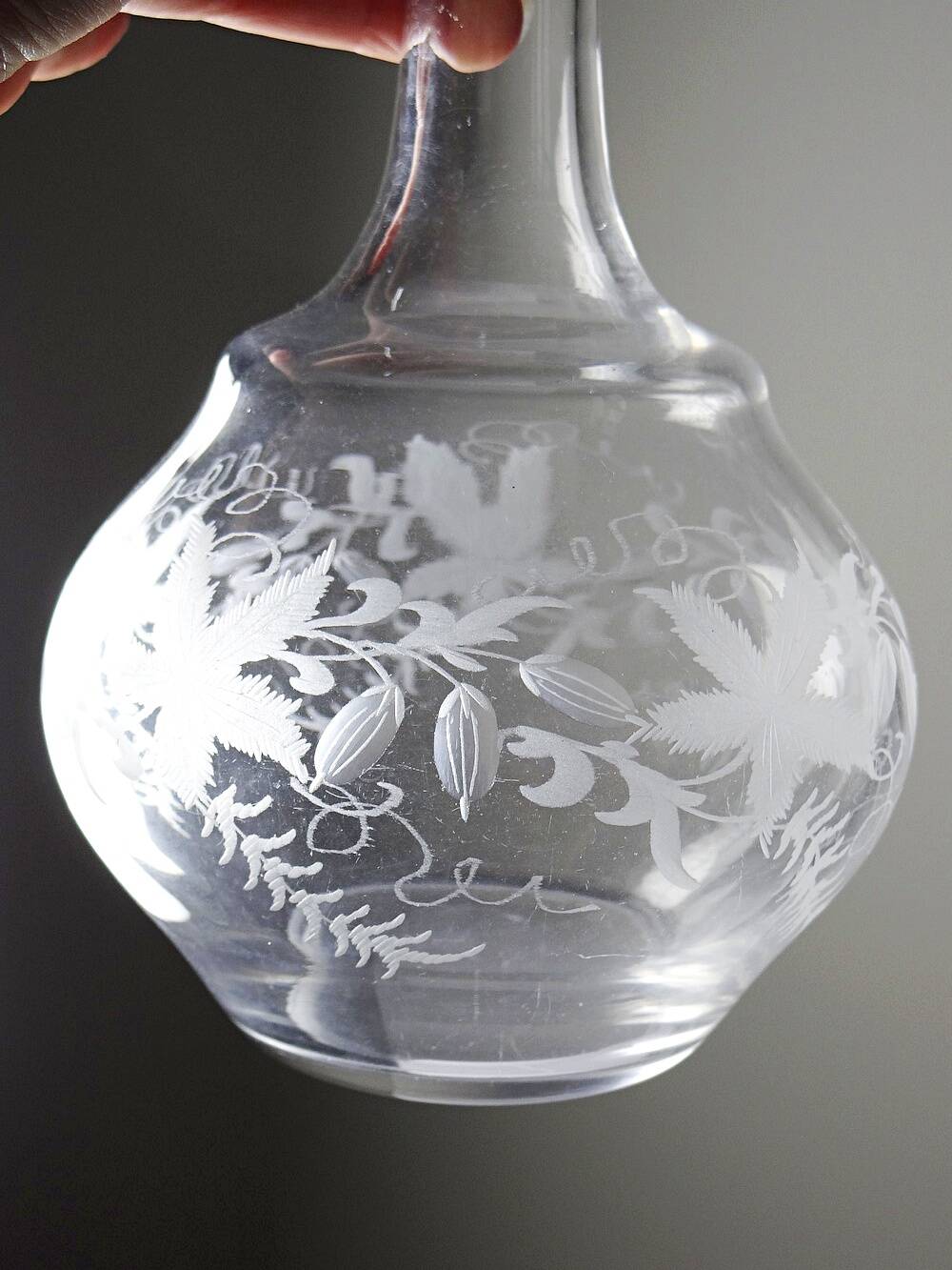 Antique engraved crystal carafe, floral decoration, Bohemia 19th-20th century.