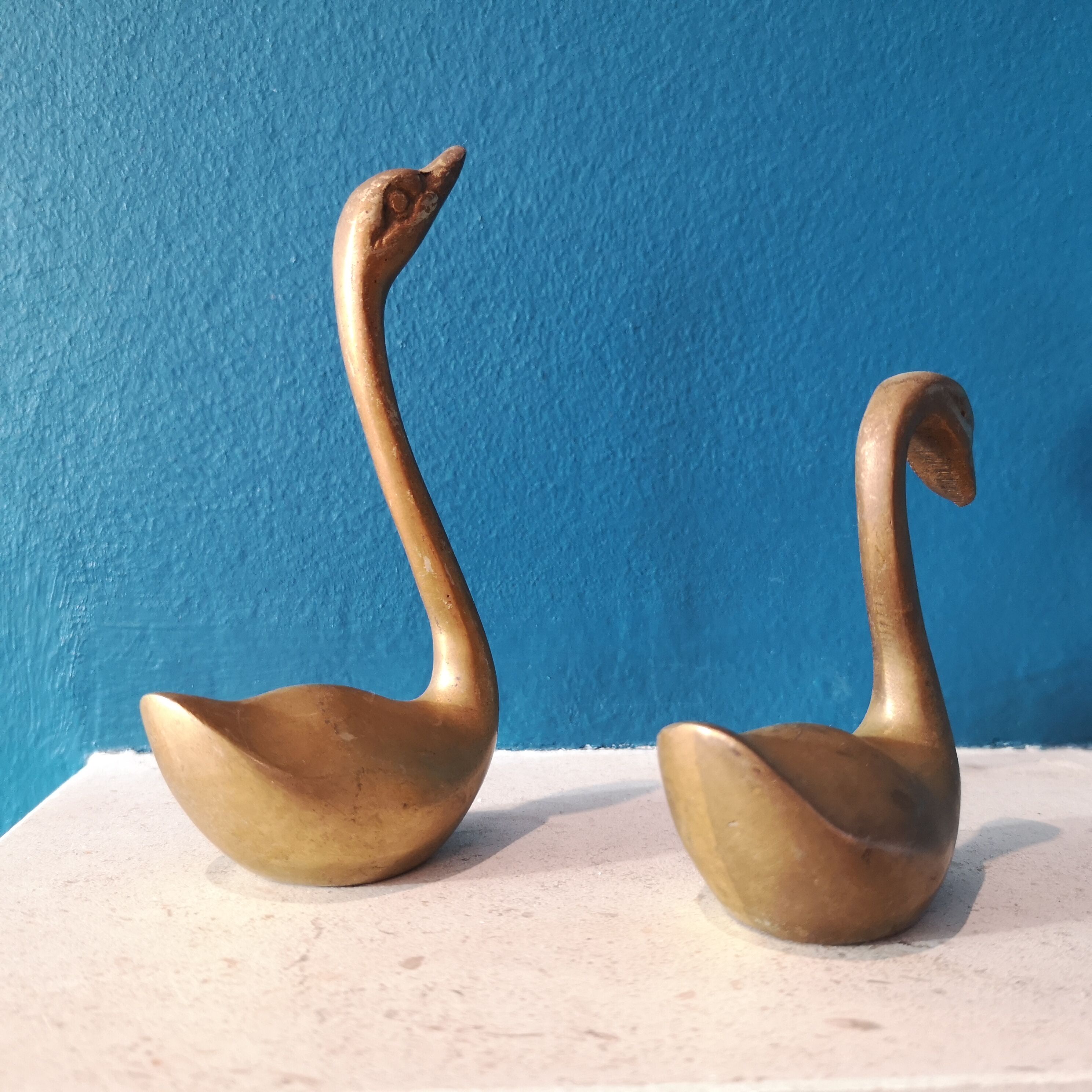Couple of brass swans