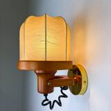 Pair of articulated "Cocoon" wall lights in resin and pine, Italy, circa 1970s