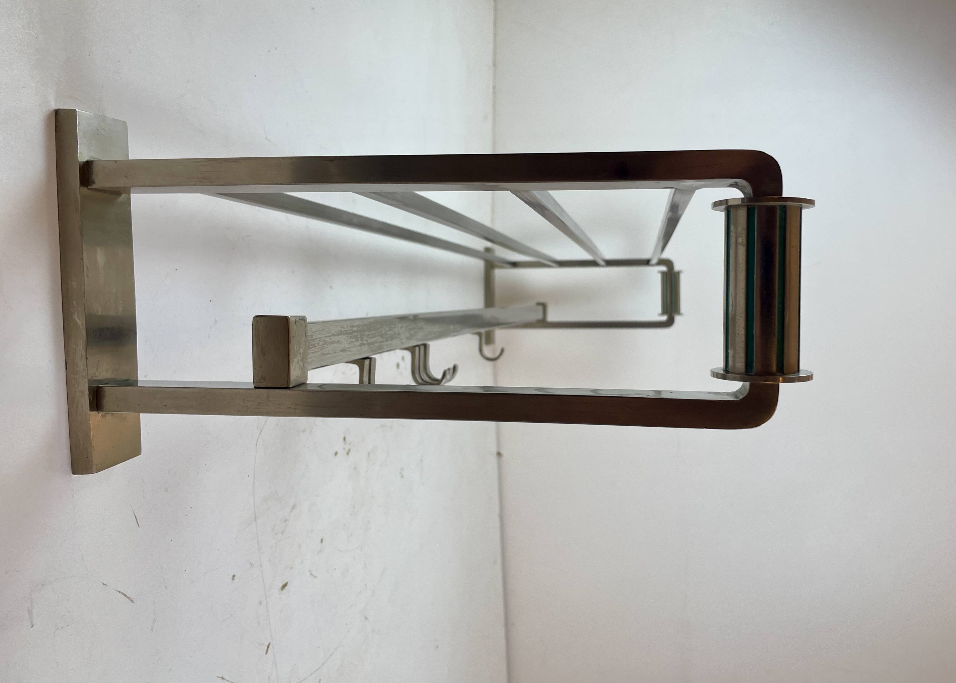 Art Deco coat rack in the style of a train carriage, 1930s.