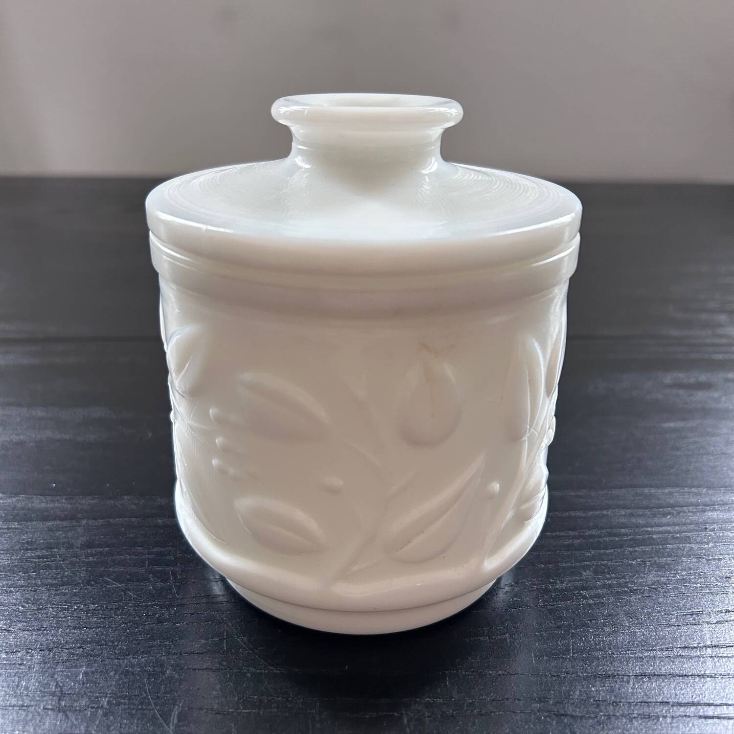 White pot with plant decoration