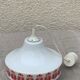 Pendant lamp, white opaline globe with a vintage red design floral pattern 1970