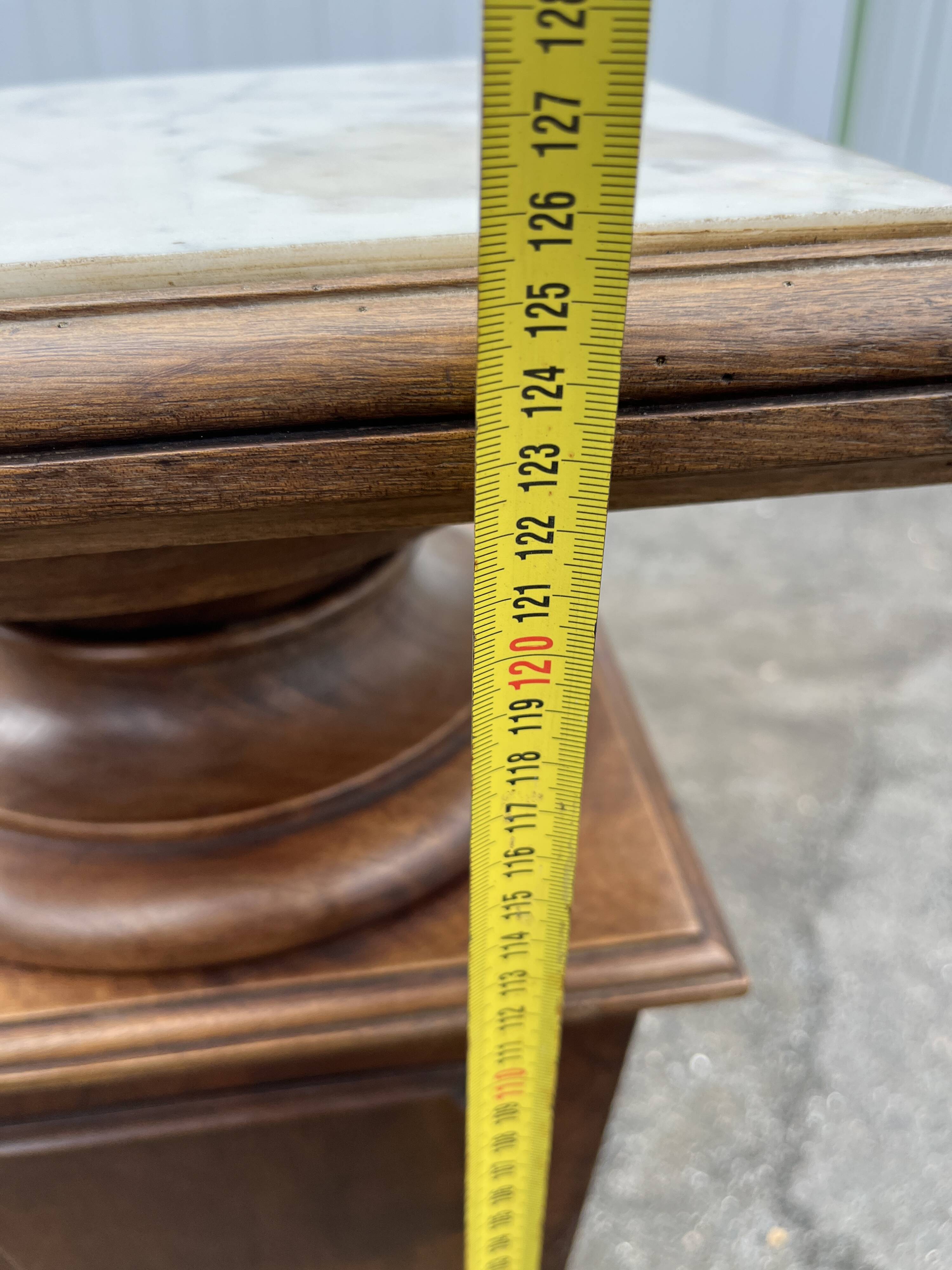 Large wooden and marble column/sheath