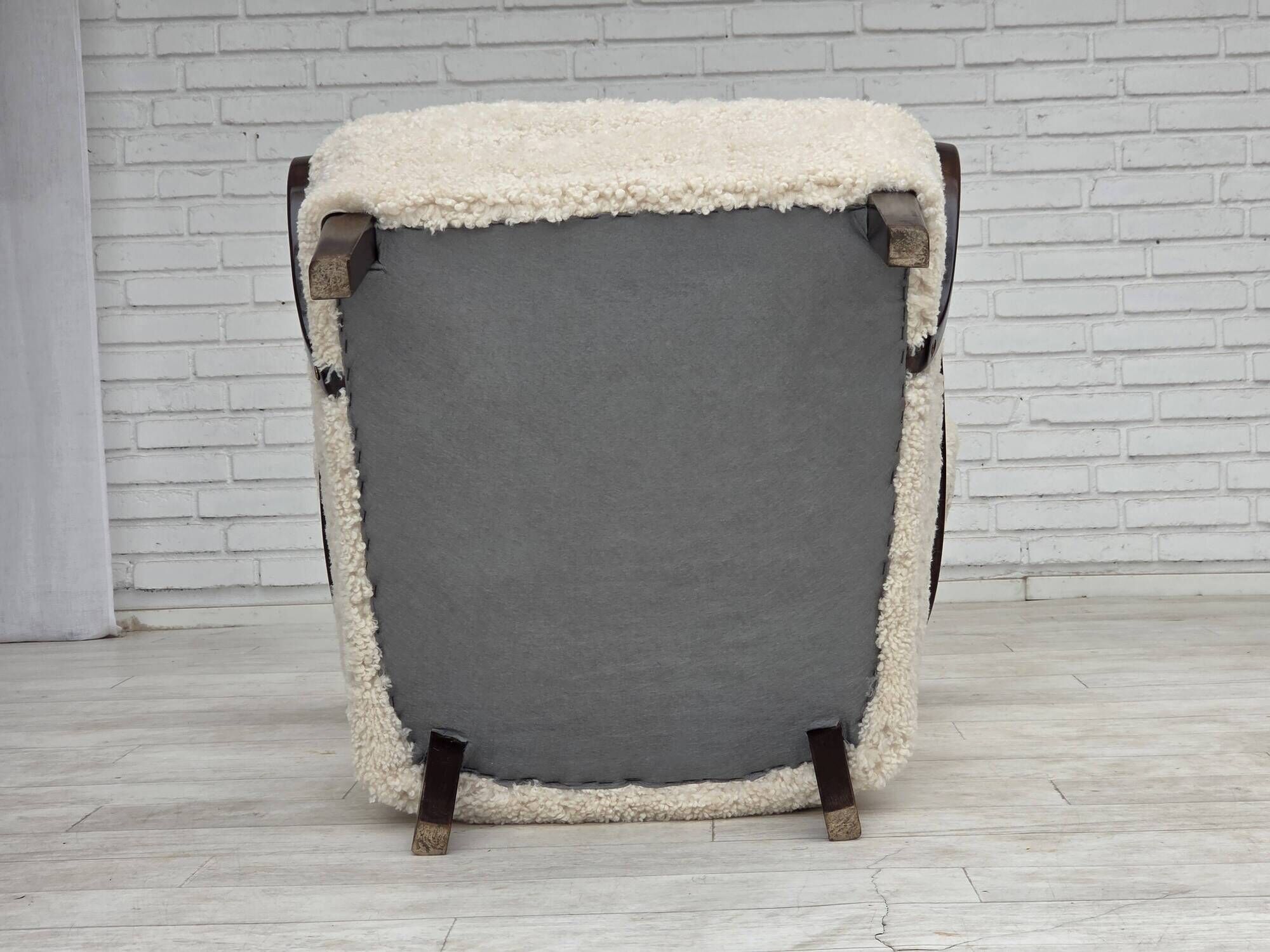 1960s, Danish high-back armchair, genuine sheepskin, reupholstered.