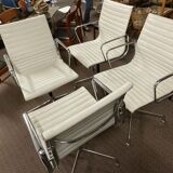Suite of 4 armchairs in white Ray and Charles Eames leather