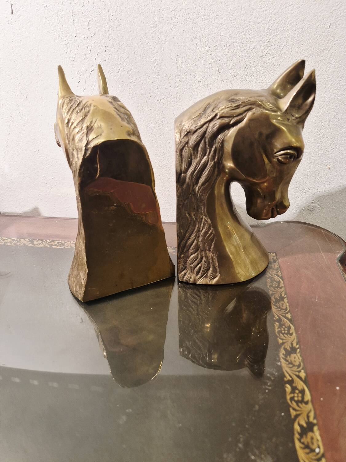 Serre livre têtes de cheval en laiton vintage