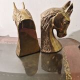 Serre livre têtes de cheval en laiton vintage