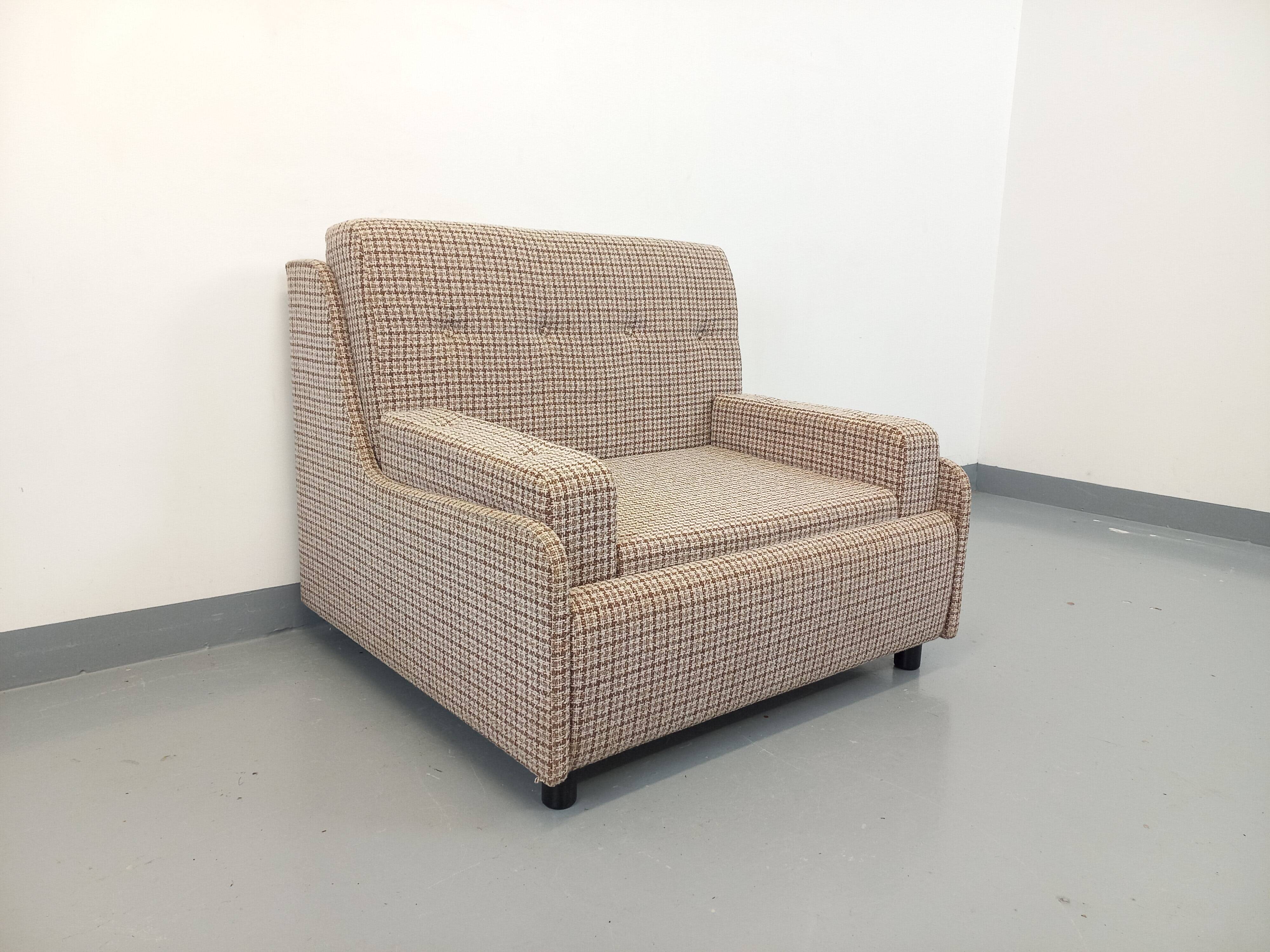 Vintage wool fabric armchair from the 1970s.