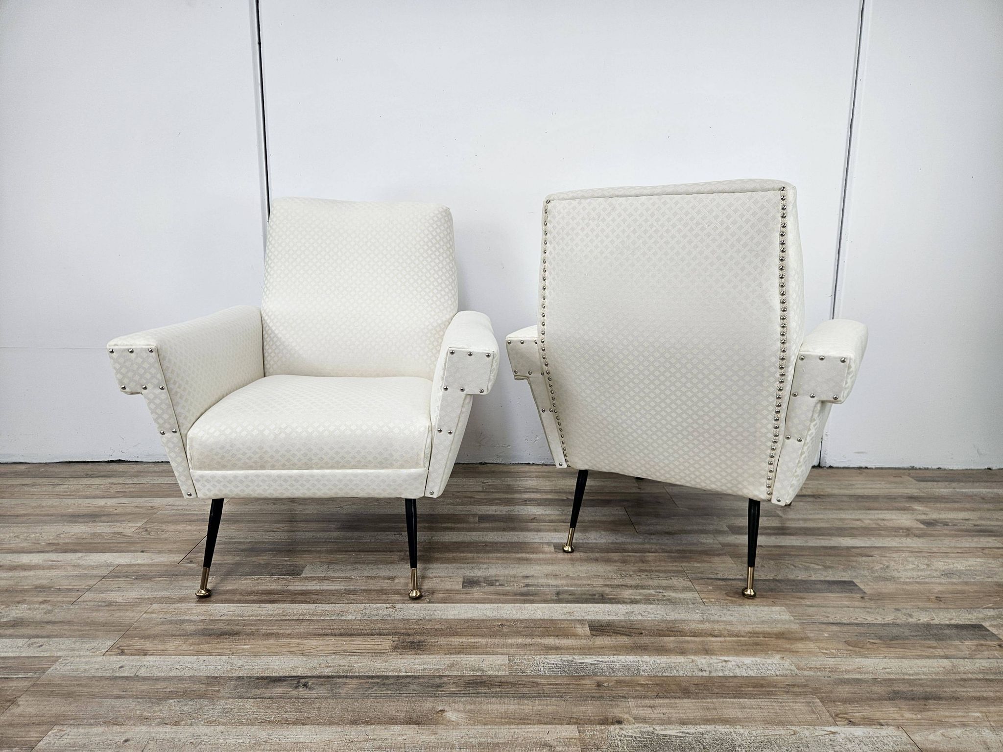 Italian armchairs from the 1950s in cream fabric with iron legs.