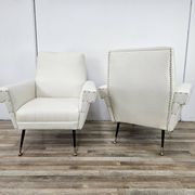 Italian armchairs from the 1950s in cream fabric with iron legs.
