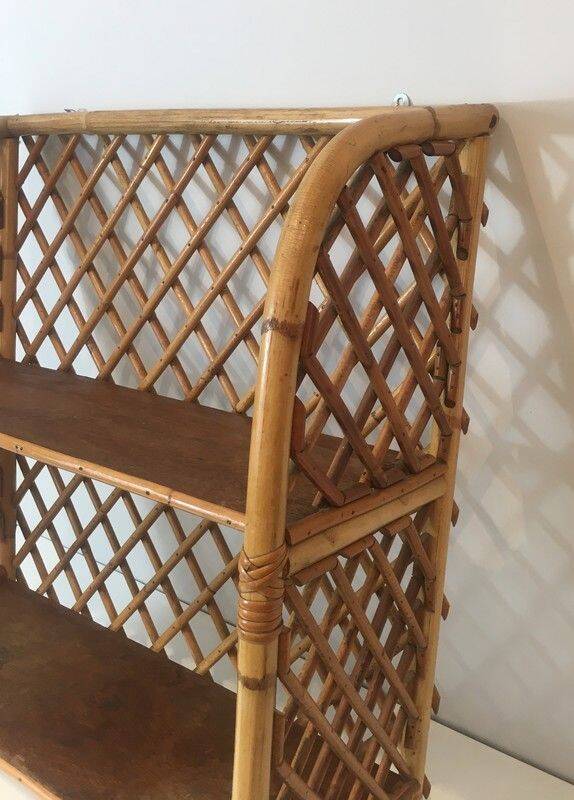 Rattan wall shelf. Attributed to Audoux-Minet