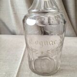 Bottle in gravel glass cognac of the years 1930