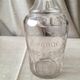 Bouteille en verre grave cognac des années 1930