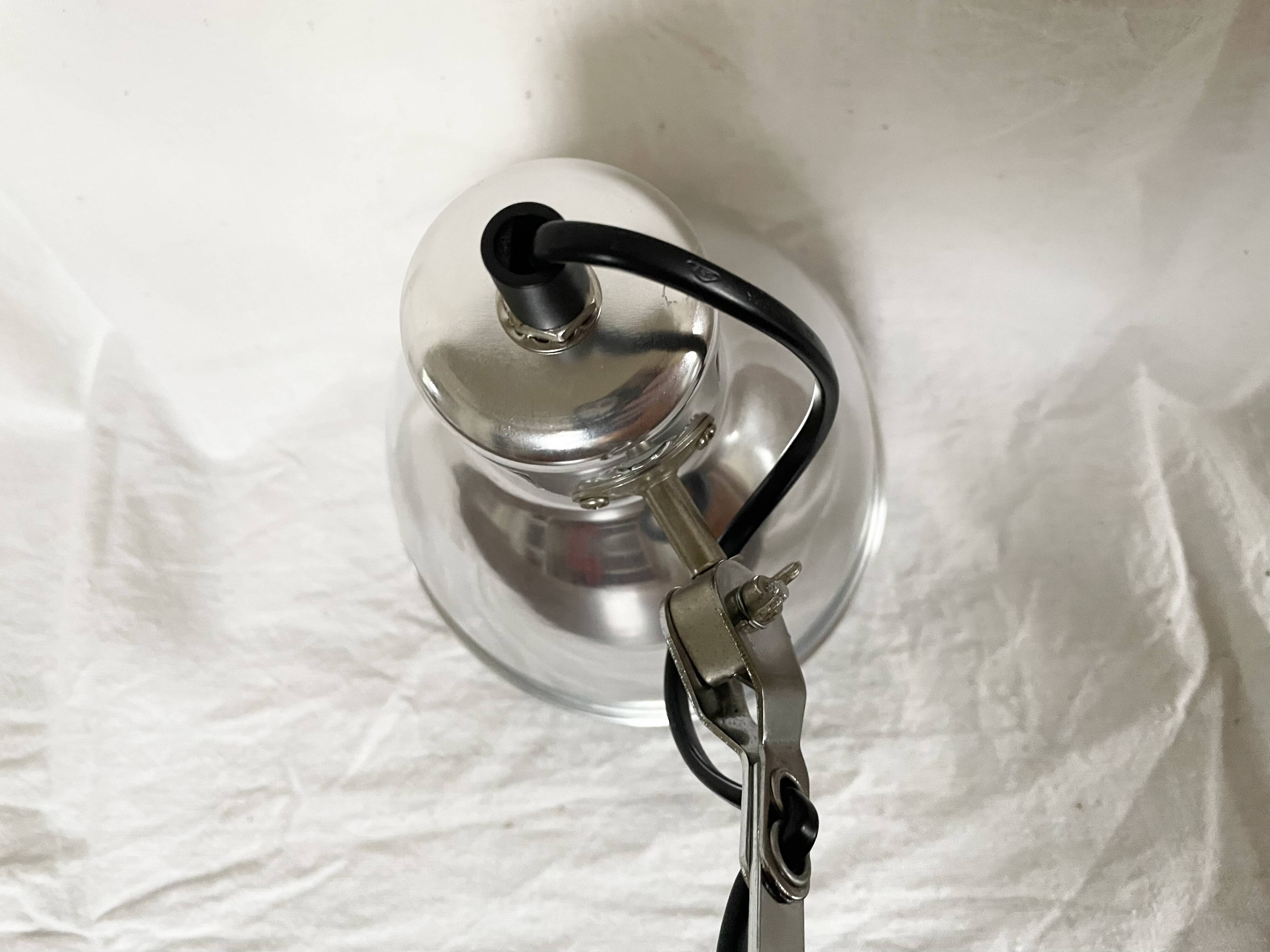 Vintage accordion wall light in chrome metal.