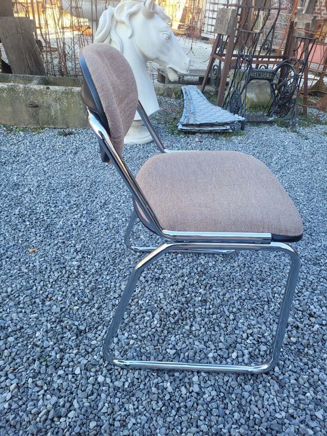 Vintage office chair with chrome base and fabric top