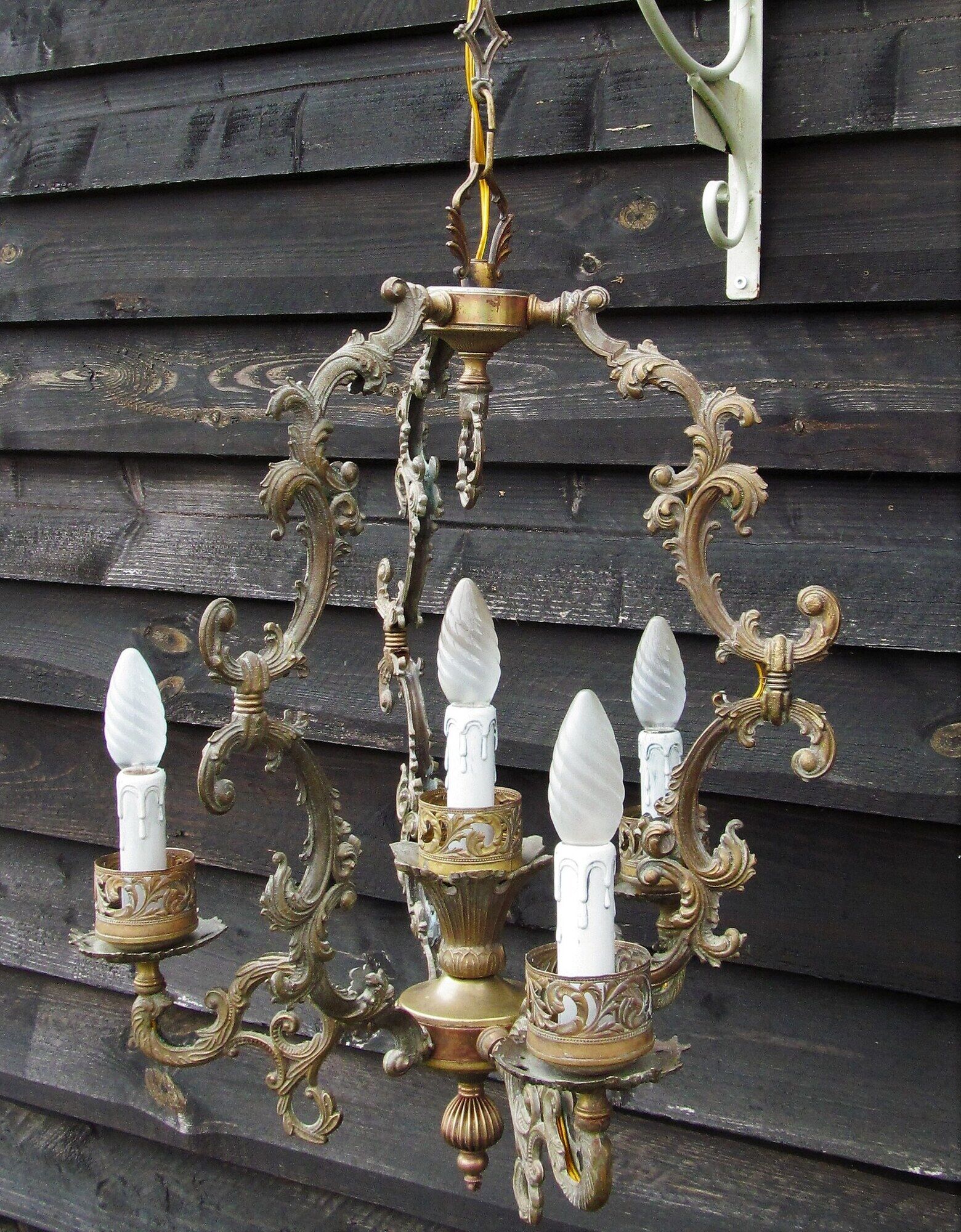 Italian Vintage patinated bronze chandelier with 4 lights with a beautiful wow patina