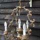 Italian Vintage patinated bronze chandelier with 4 lights with a beautiful wow patina