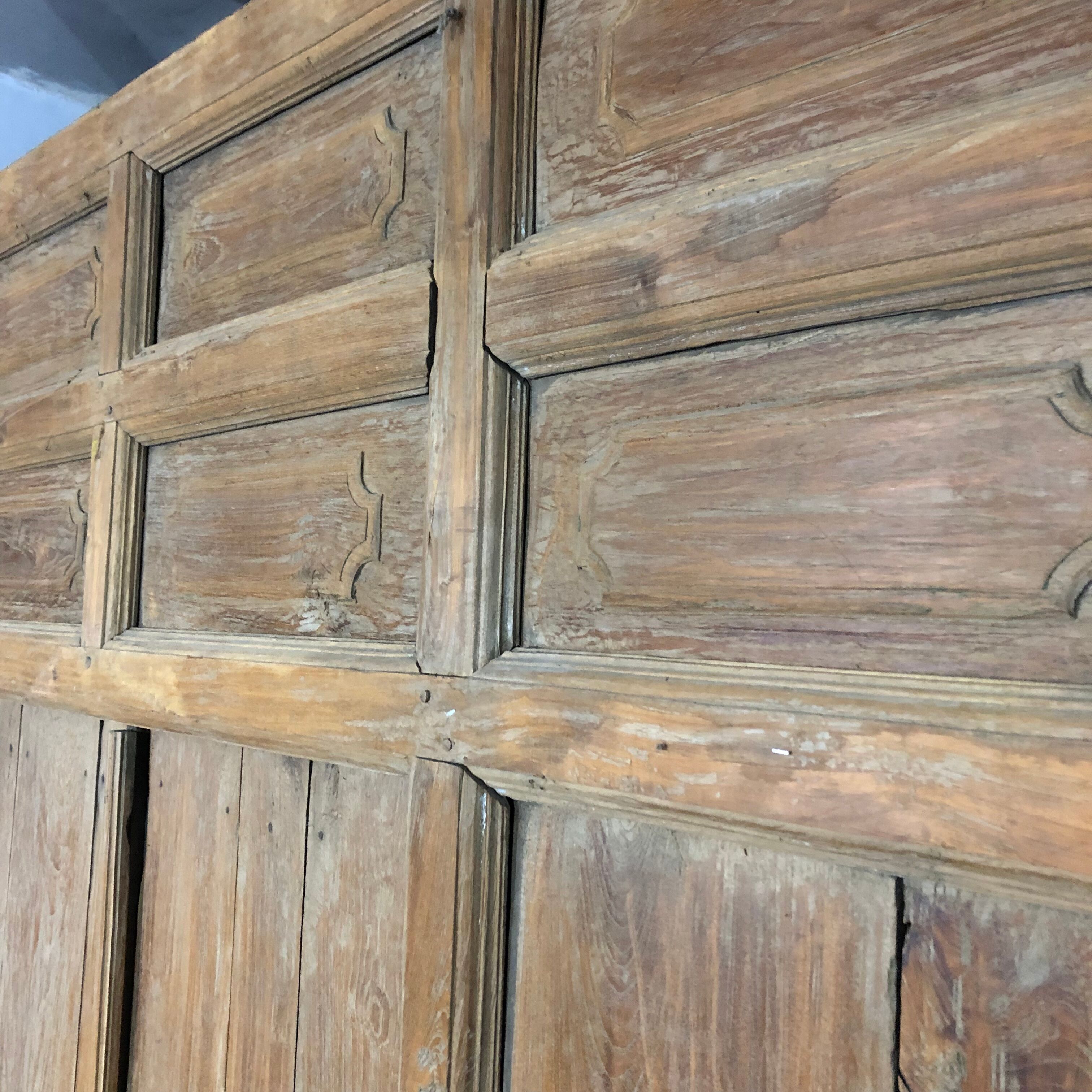 Old wooden door with its frame
