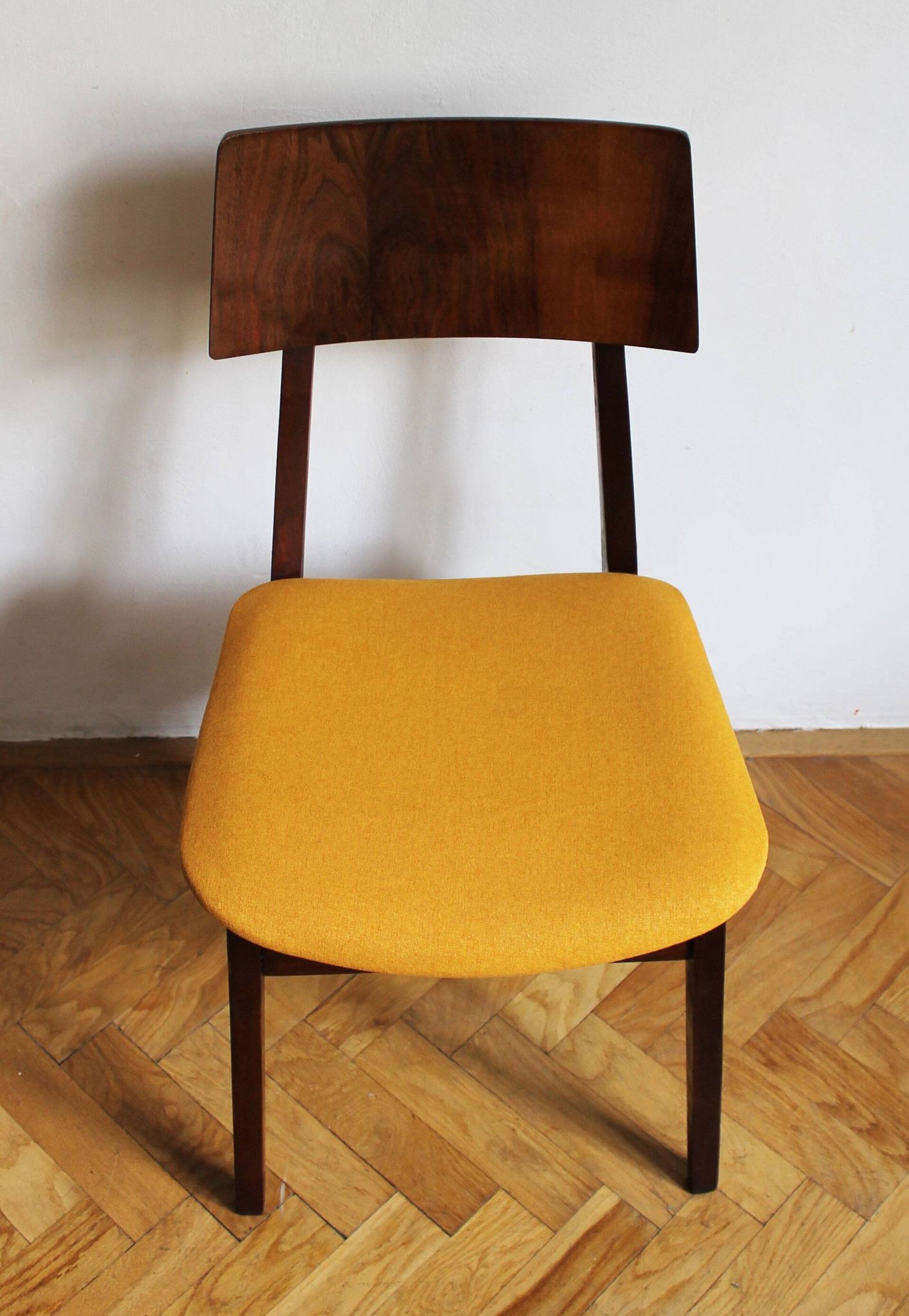 Vintage dining chair from the 1960s, Scandinavian style, wood and fabric.