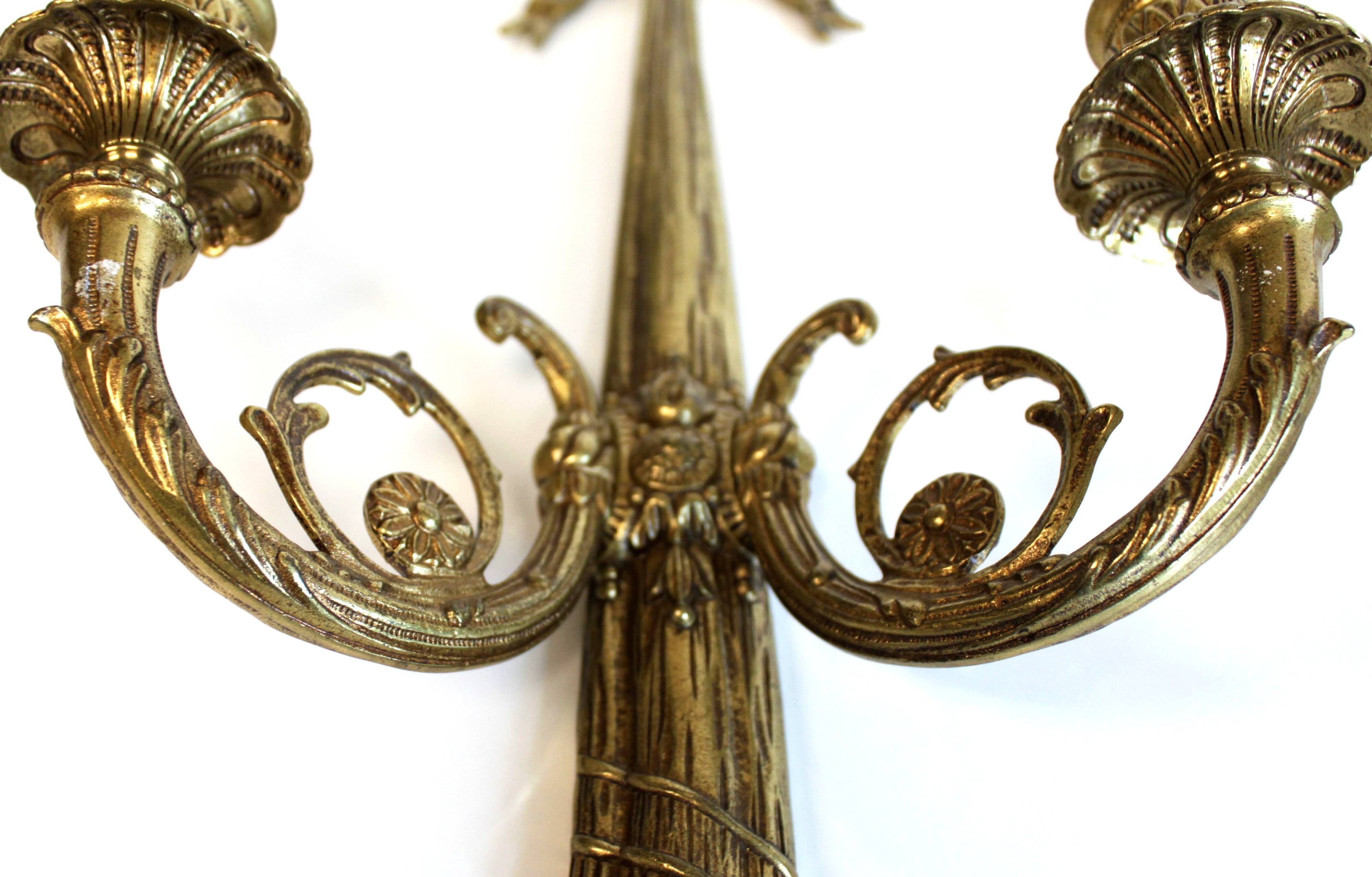 Pair of wall sconces in gilded bronze, Louis XVI style.