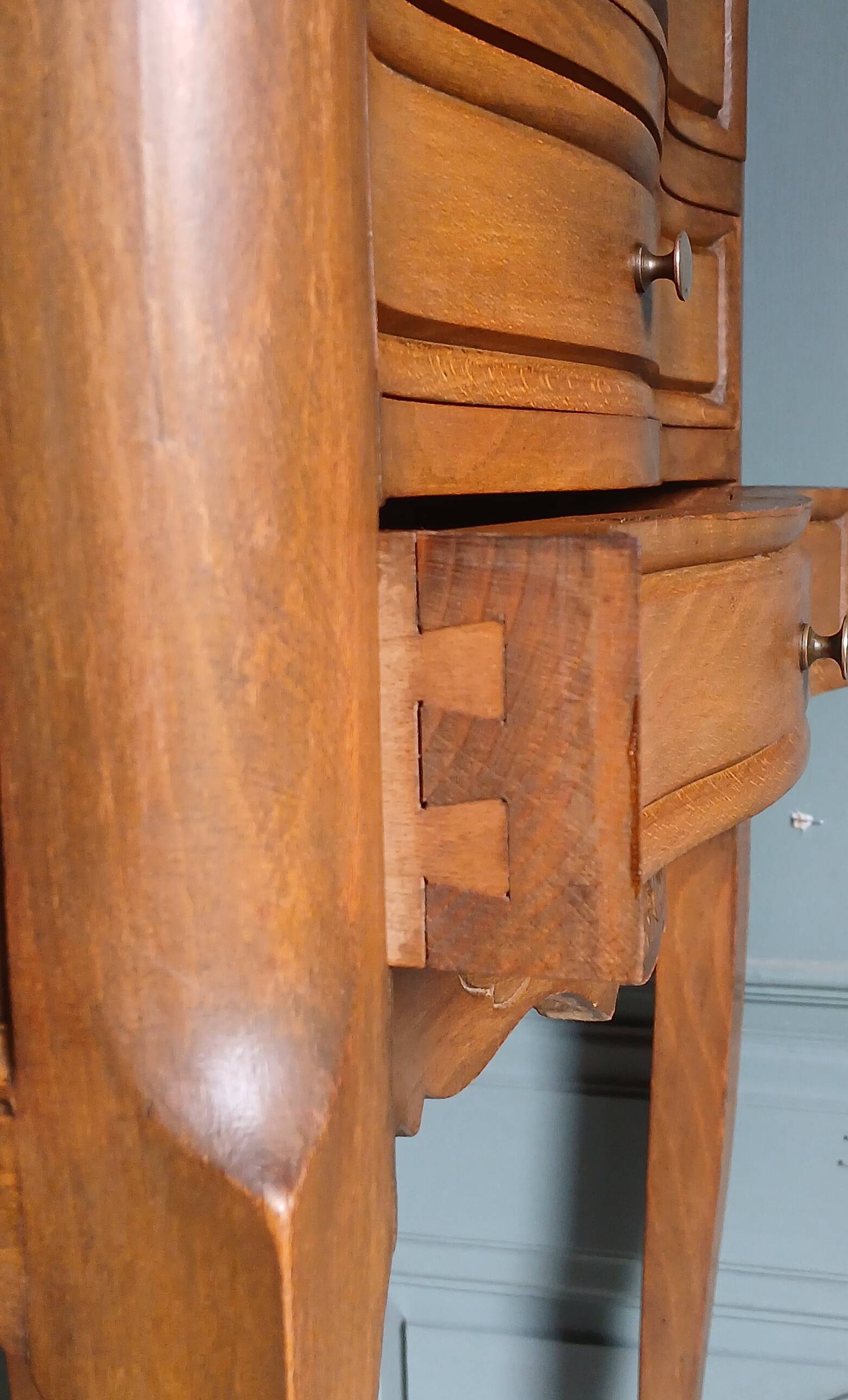 Curved fruitwood chiffonnier in Louis XV style.