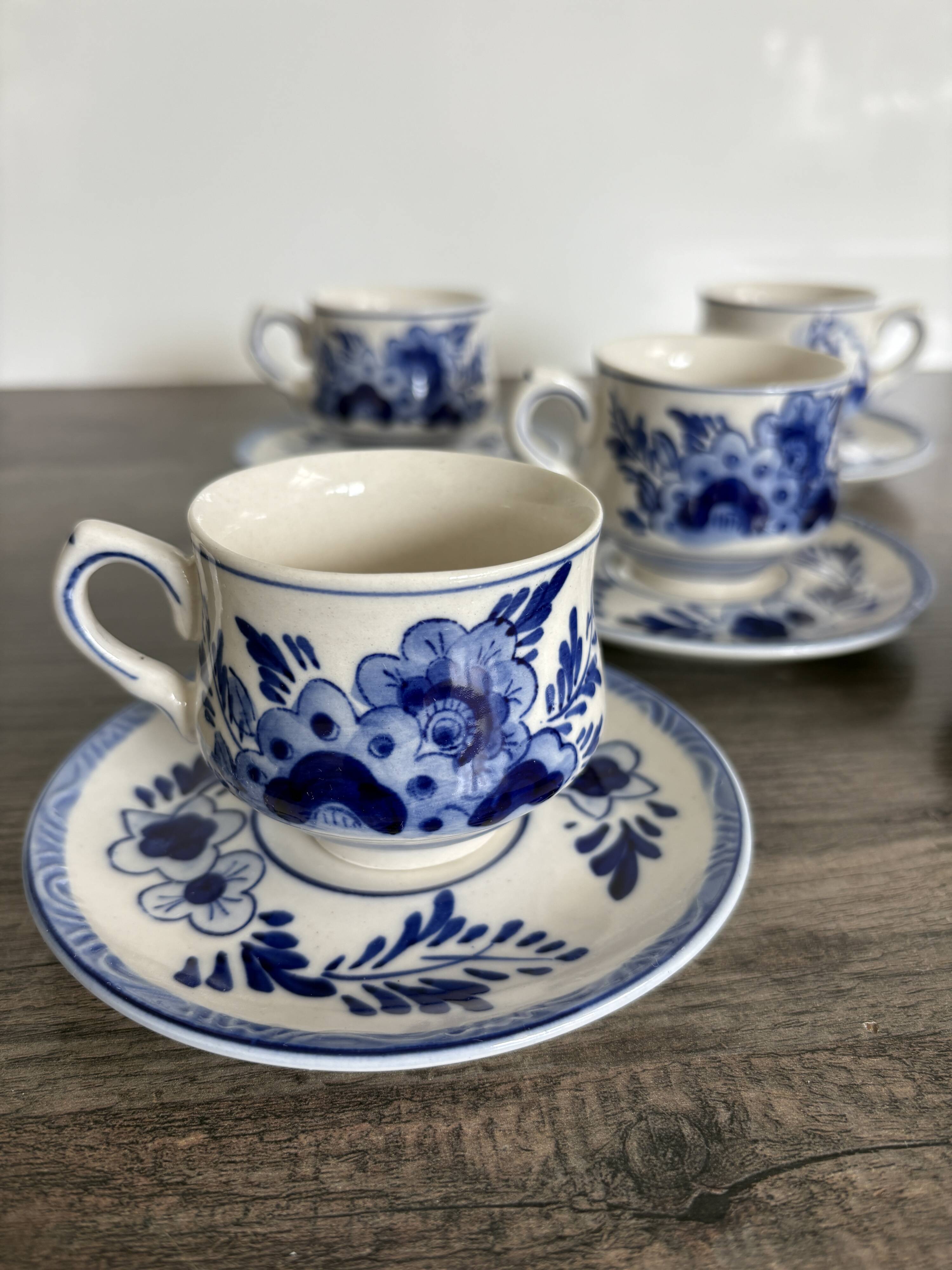 Vintage Dutch Delft Blue earthenware service for 5 cups and saucers.