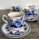 Vintage Dutch Delft Blue earthenware service for 5 cups and saucers.